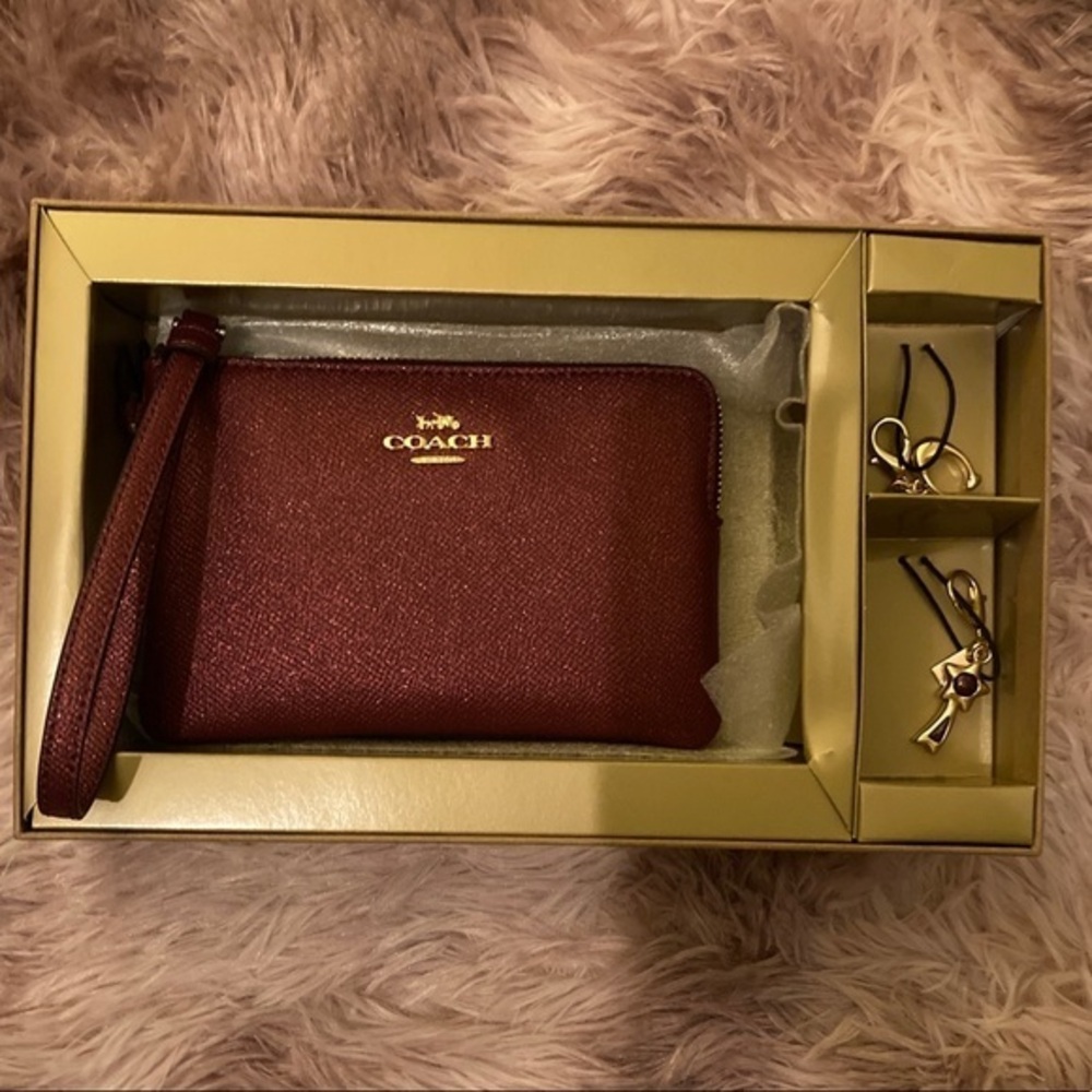 Coach Black Cherry Gift Set with Wristlet and two charms NWT